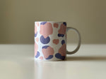 Ceramic mug with abstract art