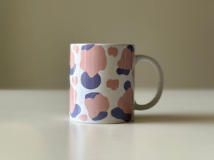 Ceramic mug with abstract art
