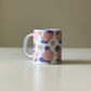 Ceramic mug with abstract art