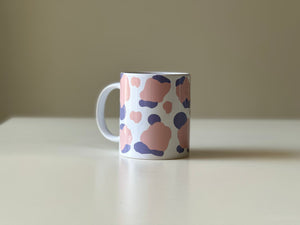 Ceramic mug with abstract art