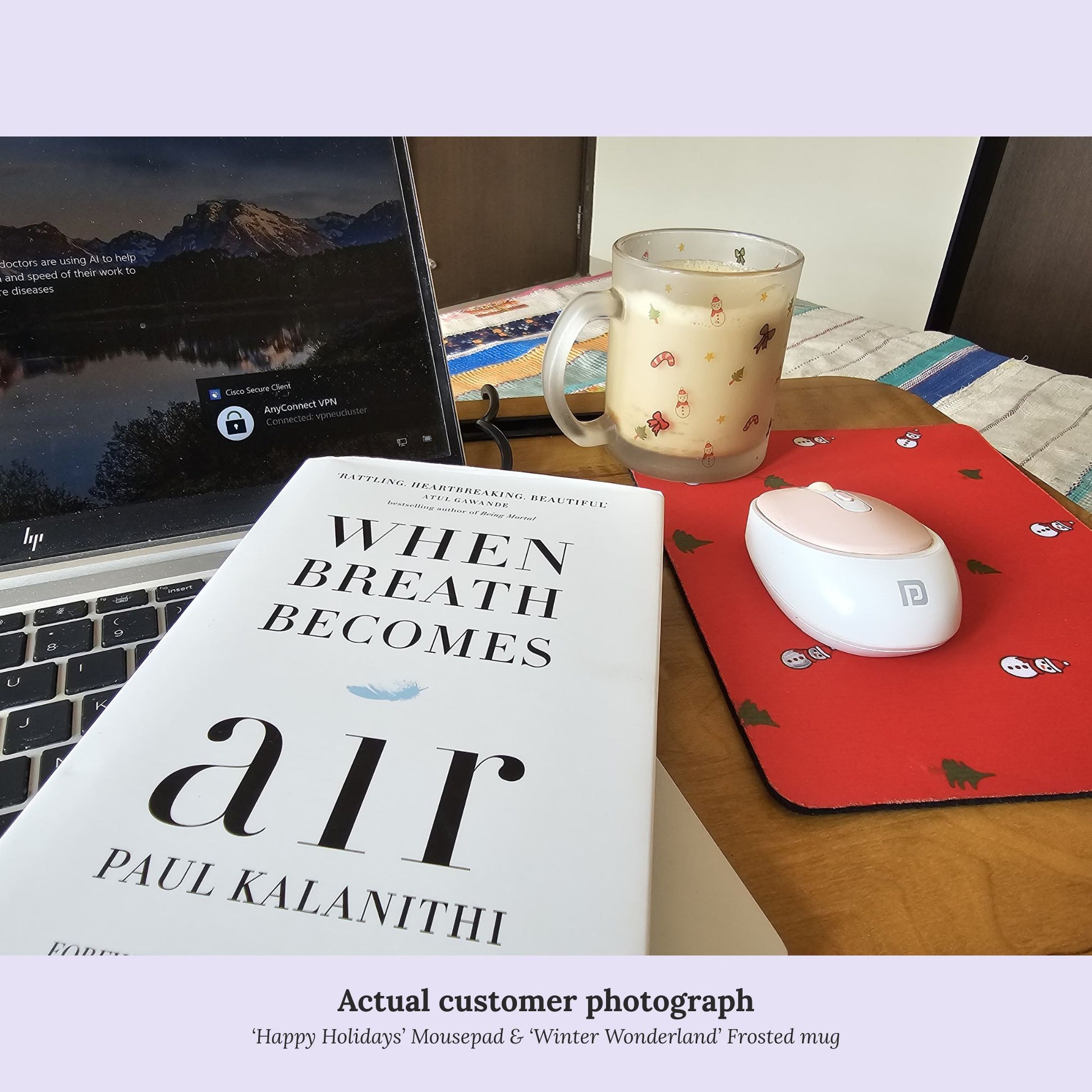 Book and laptop with Orange Espresso red mousepad and Orange Espresso frosted mug filled with a beverage.