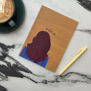 OE Atelier Softbound Notebook (100 GSM) – ‘Thinking Girl’ in a styled lifestyle setting