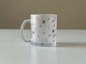 Another angle of Orange Espresso frosted mug with Christmas themed design.